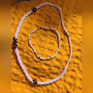 WHITE SEED BEADED BLACK AND GOLD NECKLACE AND BRACELET SET!